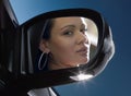 Face in rear-view mirror Royalty Free Stock Photo