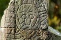 Face on a rune stone