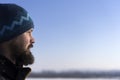 Face of Scandinavian bearded man in profile. Bearded looking into the distance. Close-up Royalty Free Stock Photo