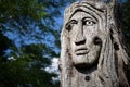 Face sculpted in wood Ferrieres-en-Brie Forest by Daniel Stinus