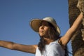 Face of a sexy tourist among the palm trees enjoying the desert of the palm grove of Marrakech in Morocco Royalty Free Stock Photo