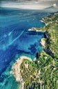 Face shapes coast along Punta Campanella near Sorrento, Italy. Amazing aerial view from drone in summer season