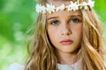 Face shot of cute girl with headband.