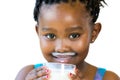 Face shot of sweet african girl with milk mustache. Royalty Free Stock Photo