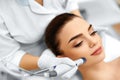 Face Skin Care. Facial Hydro Microdermabrasion Peeling Treatment Royalty Free Stock Photo