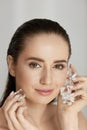 Face Skin Care. Woman Applying Ice Cubes Royalty Free Stock Photo