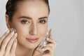 Face Skin Care. Woman Applying Ice Cubes Royalty Free Stock Photo