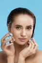 Face Skin Care. Woman Applying Ice Cubes Royalty Free Stock Photo