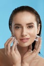 Face Skin Care. Woman Applying Ice Cubes Royalty Free Stock Photo