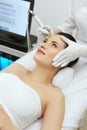 Face Skin Care. Woman Getting Facial Hydro Exfoliating Treatment