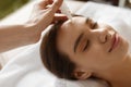 Face Skin Care. Woman Receiving Serum Treatment In Beauty Salon Royalty Free Stock Photo