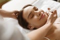 Face Skin Care. Woman Receiving Serum Treatment In Beauty Salon Royalty Free Stock Photo