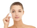 Face, skincare or cotton pad for woman in studio for wellness, shine or glow on white background. Cleaning, portrait or