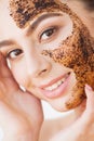Face Skincare. Young Charming Girl Makes a Black Charcoal Mask on Her Face Royalty Free Stock Photo