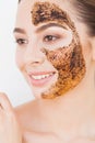 Face Skincare. Young Charming Girl Makes a Black Charcoal Mask on Her Face Royalty Free Stock Photo