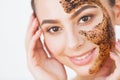 Face Skincare. Young Charming Girl Makes a Black Charcoal Mask on Her Face Royalty Free Stock Photo