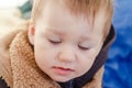 The face of a small child with closed eyes and long eyelashes Royalty Free Stock Photo