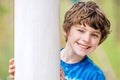 Face of smiling happy boy outside Royalty Free Stock Photo