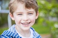 Face of smiling happy boy outside Royalty Free Stock Photo