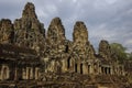 Face stone of ancient Bayon Temple in Angkor Wat, Siem Reap Royalty Free Stock Photo