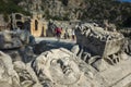 Face stone carving in ancient town of Myra in Lycia region, Antique culture archaelogical site, Ruins of ancient city Royalty Free Stock Photo