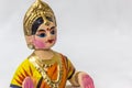 Face of a Thanjavur dancing doll Called as Thalaiyatti Bommai in Tamil language with look alike traditional dress and oranments Royalty Free Stock Photo