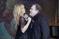 The Late Meat Loaf duets with one of his his blonde backing singers on 2013 tour in the UK in 2013 Royalty Free Stock Photo