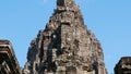 Face tower at the Bayon Temple in Angkor wat complex, Siem Reap Cambodia Royalty Free Stock Photo