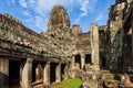 Face tower and inner gallery in the Bayon temple in Angkor Thom, Angkor. Cambodia Royalty Free Stock Photo