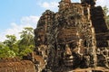 Face towers of the Bayon temple, In the center of Angkor Thom , Siem Reap, Cambodia. Royalty Free Stock Photo