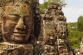 Face towers of the Bayon temple, In the center of Angkor Thom , Siem Reap, Cambodia. UNESCO World Heritage Site Royalty Free Stock Photo