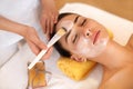 Face Treatment. Woman in Beauty Salon Gets Marine Mask Royalty Free Stock Photo