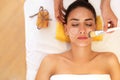 Face Treatment. Woman in Beauty Salon Gets Marine Mask Royalty Free Stock Photo