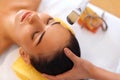 Face Treatment. Woman in Beauty Salon Gets Marine Mask