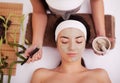 Face Treatment. Woman in Beauty Salon Gets Marine Mask Royalty Free Stock Photo