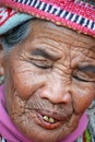 Face of unknown old ifugao woman in national costume near rice terraces. Banaue, Luzon, Philippines Royalty Free Stock Photo