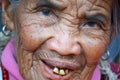 Face of unknown old ifugao woman in national costume near rice terraces. Banaue, Luzon, Philippines Royalty Free Stock Photo