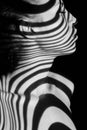 The face of woman with black and white zebra Royalty Free Stock Photo