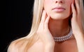 Face of woman and pearl necklace Royalty Free Stock Photo