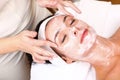 Face of women getting a spa treatment Royalty Free Stock Photo