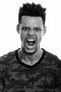 Face of young angry African man shouting Royalty Free Stock Photo