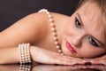 The face of a young attractive woman with pearl necklace Royalty Free Stock Photo