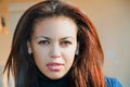 Face of a young mulatto woman close-up