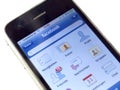 Facebook.com on a iPhone Royalty Free Stock Photo