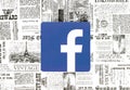 Facebook icon placed on retro newspaper background