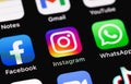 Facebook, Instagram, WhatsApp - social media app icons, messengers on screen smartphone iPhone closeup Royalty Free Stock Photo