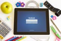 Facebook on Ipad 3 with school accesories Royalty Free Stock Photo