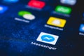 Facebook Messenger app icon on the screen smartphone Royalty Free Stock Photo