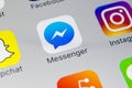 Facebook messenger application icon on Apple iPhone X screen close-up. Facebook messenger app icon. Online internet social media Royalty Free Stock Photo