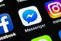 Facebook messenger application icon on Apple iPhone X screen close-up. Facebook messenger app icon. Online internet social media Royalty Free Stock Photo